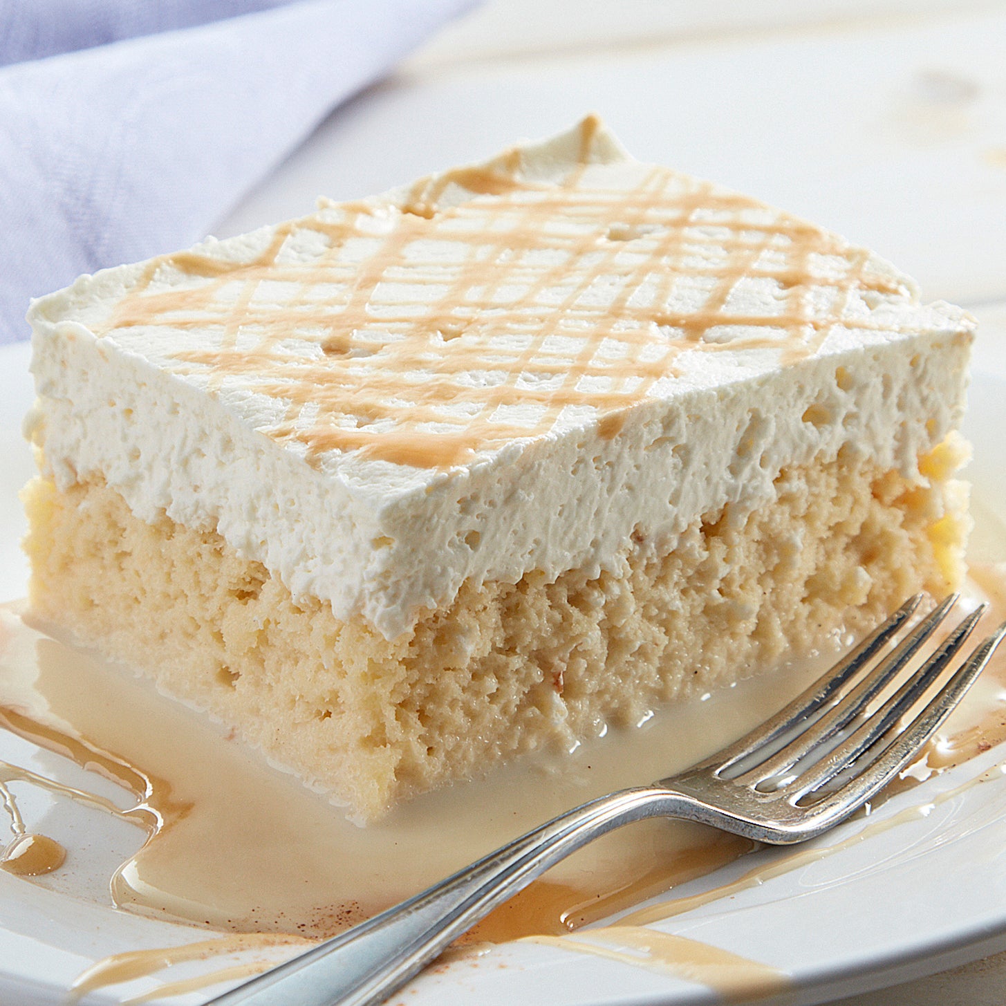 Hispanic Heritage Month tres leches cake with caramel drizzle