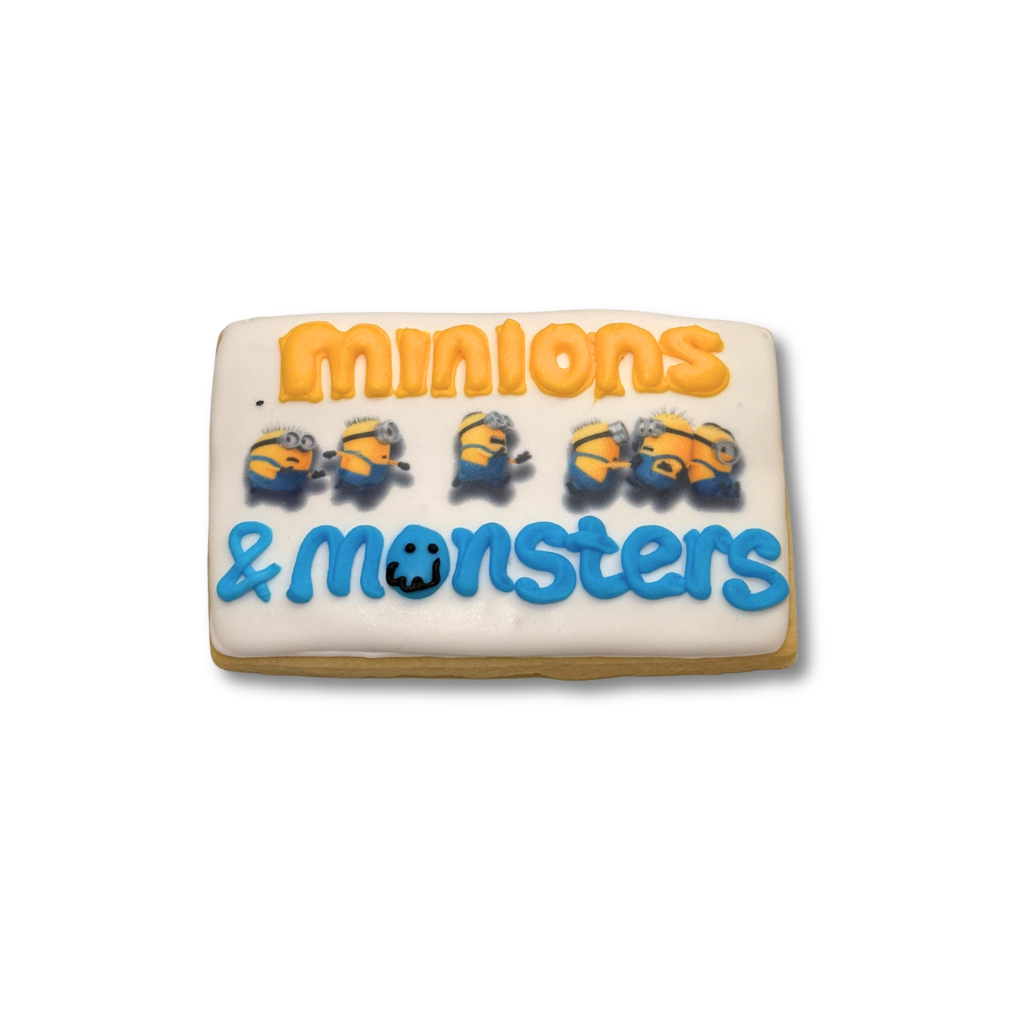 Minions Cookies with yellow and blue icing text.