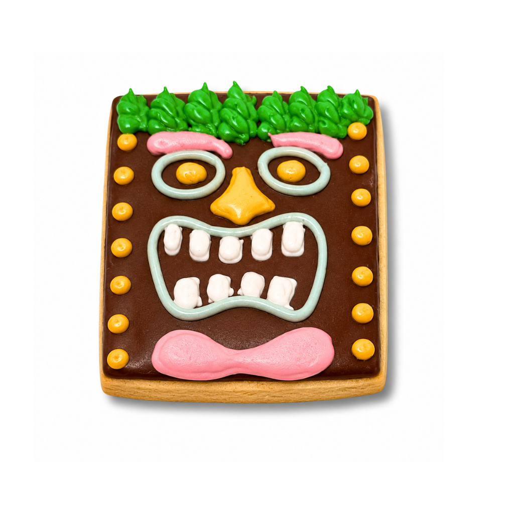 Moana tiki mask cookie with colorful icing details