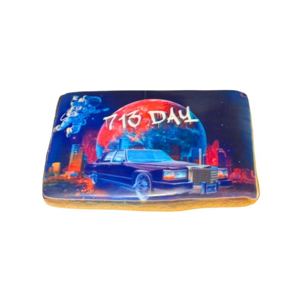 713 Cookies with a space-themed car and planet design.