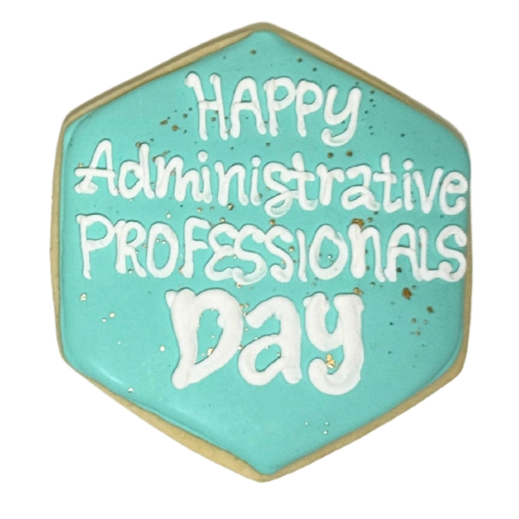 Hexagonal Administrative Professionals Day cookie with teal icing.