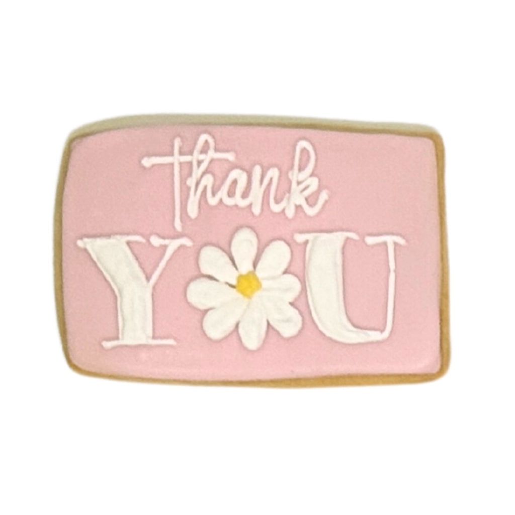Admin Professionals Week cookie with pink icing and daisy design.