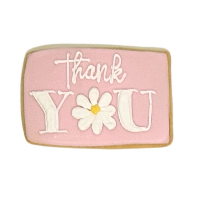 Admin Professionals Week cookie with pink icing and daisy design.