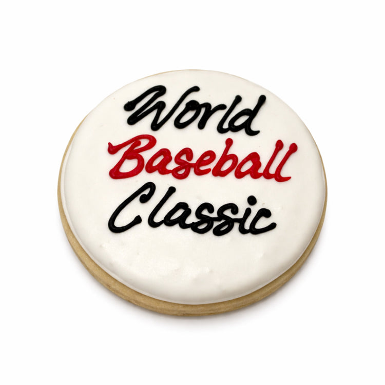 Round World Baseball Classic cookie with white icing.