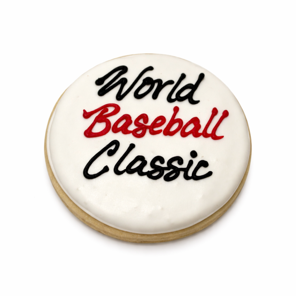 Round World Baseball Classic cookie with white icing.