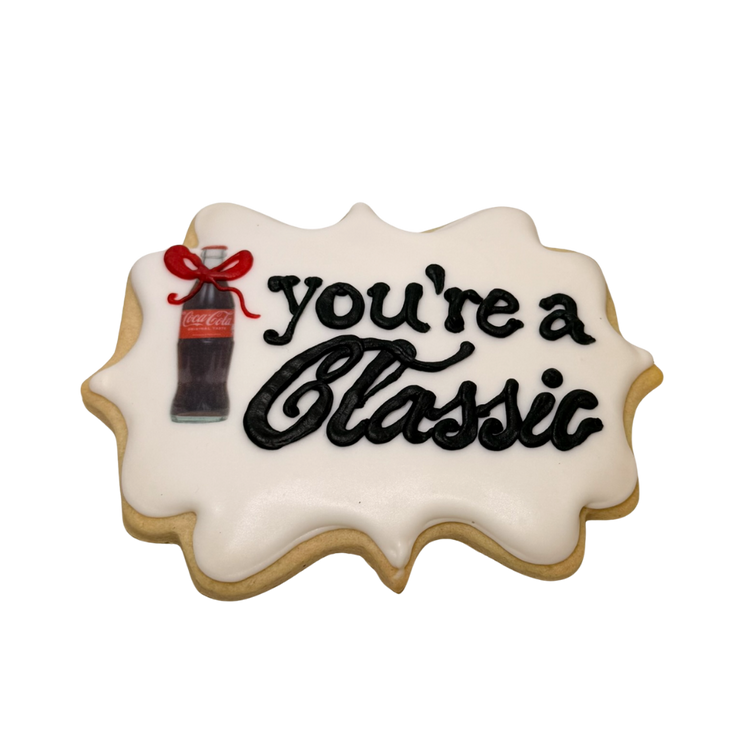 Boss's Week cookie with You're a Classic text and soda bottle.