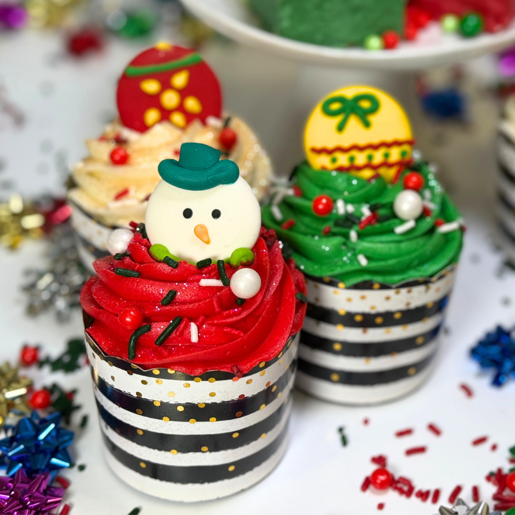 Christmas cupcakes with festive frosting and snowman topper