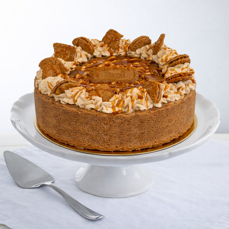 9-inch Cookie Butter Bliss cake topped with cookie pieces.