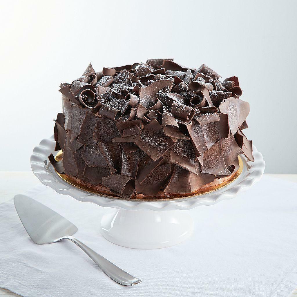 9-inch Cosmic Birthday Cake covered in dark chocolate curls
