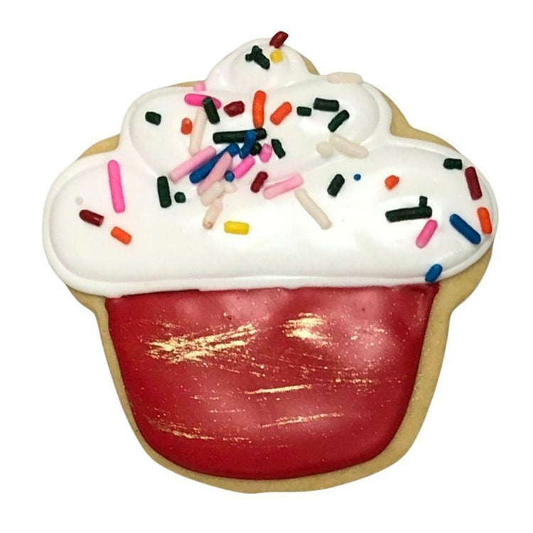 Red cupcake sugar cookie with white icing and colorful sprinkles.
