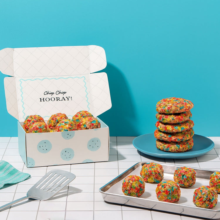 Fruity Pebble Dough by DG in a box and on a blue plate.