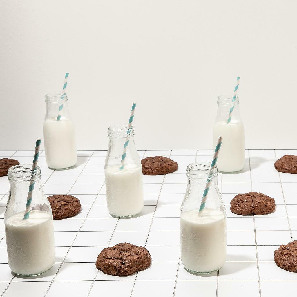 Brookie Dough by DG with milk bottles on a tiled surface