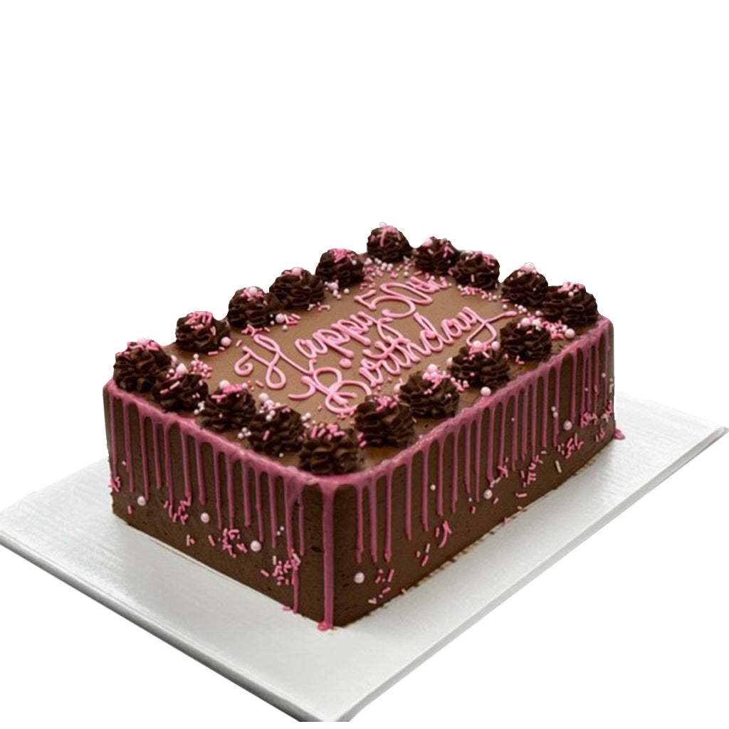 Mom's chocolate sheet cake with pink drip and icing.