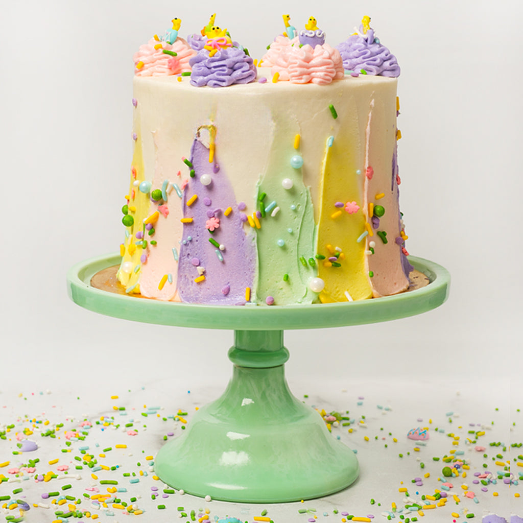 6-inch Easter cake with pastel frosting and chick toppers.