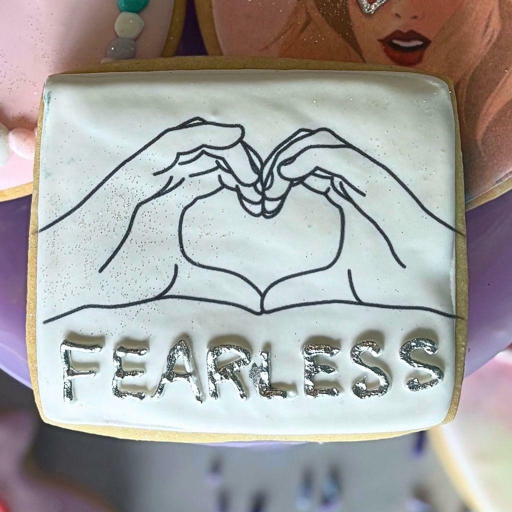 Taylor Swift Fearless square cookie with heart hand design