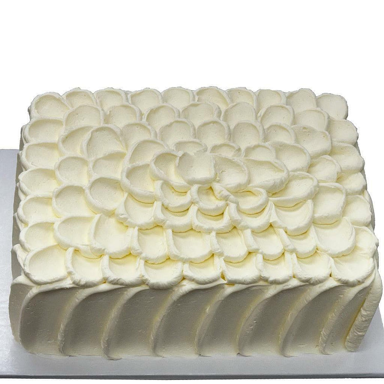 French Vanilla sheet cake with white petal frosting design