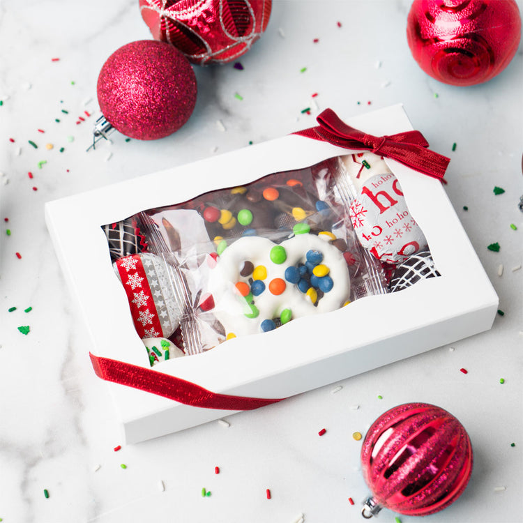 Chocolate Dipped Delights in a white gift box with red ribbon