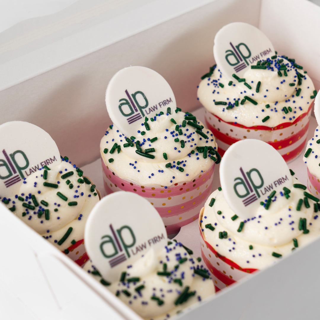 6-pack logo cupcakes with white frosting in a gift box.