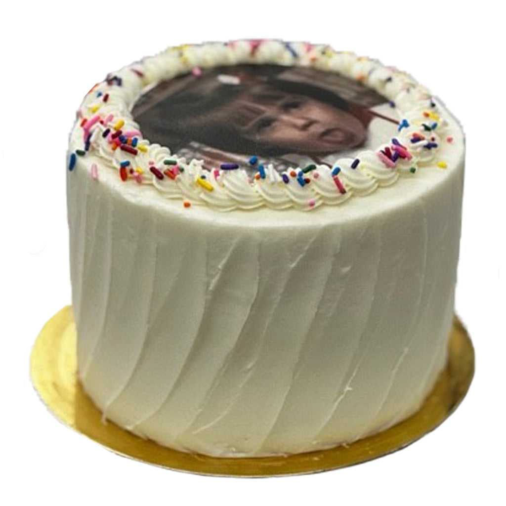 6-inch photo cake with white frosting and rainbow sprinkles