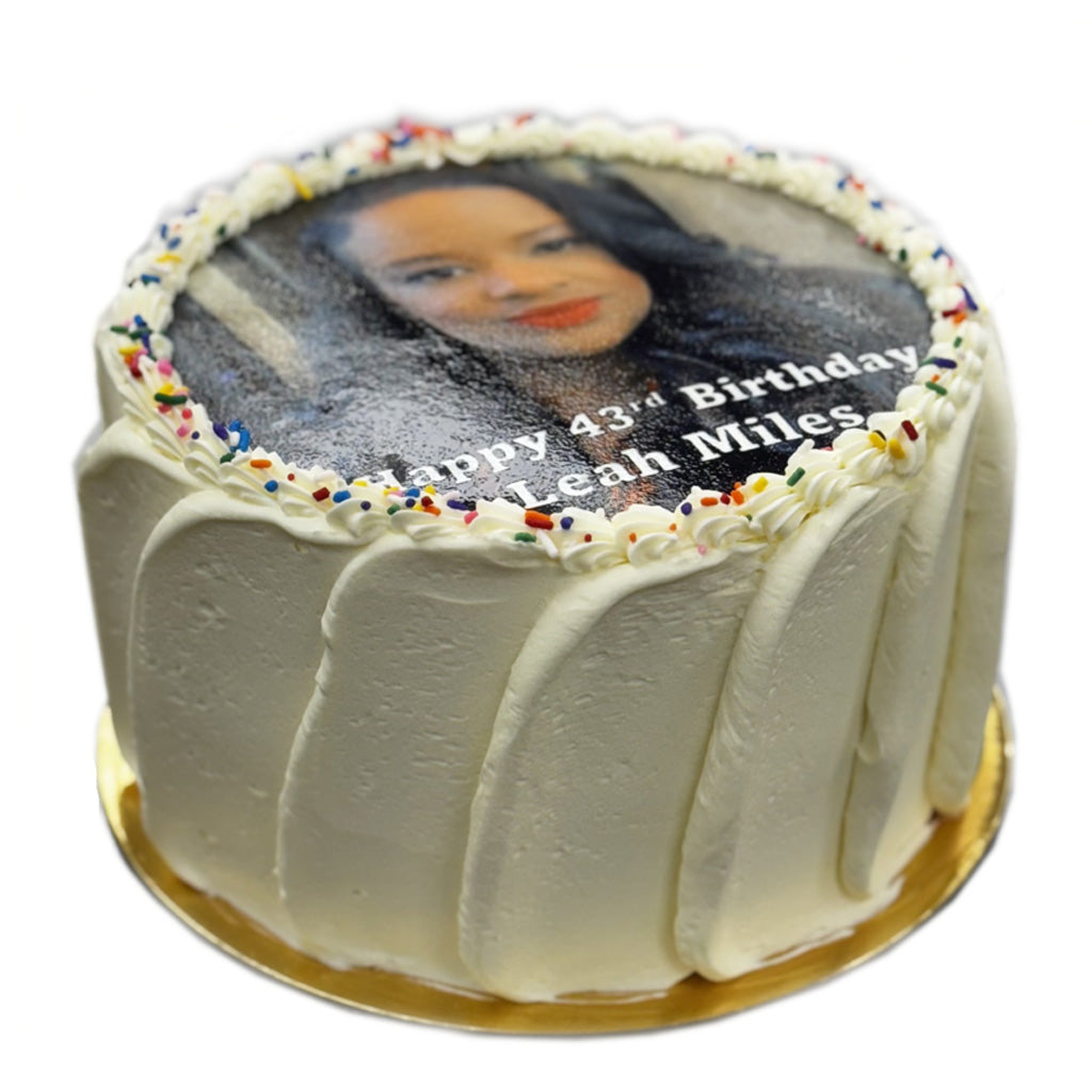 9-inch photo cake with white frosting and rainbow sprinkles