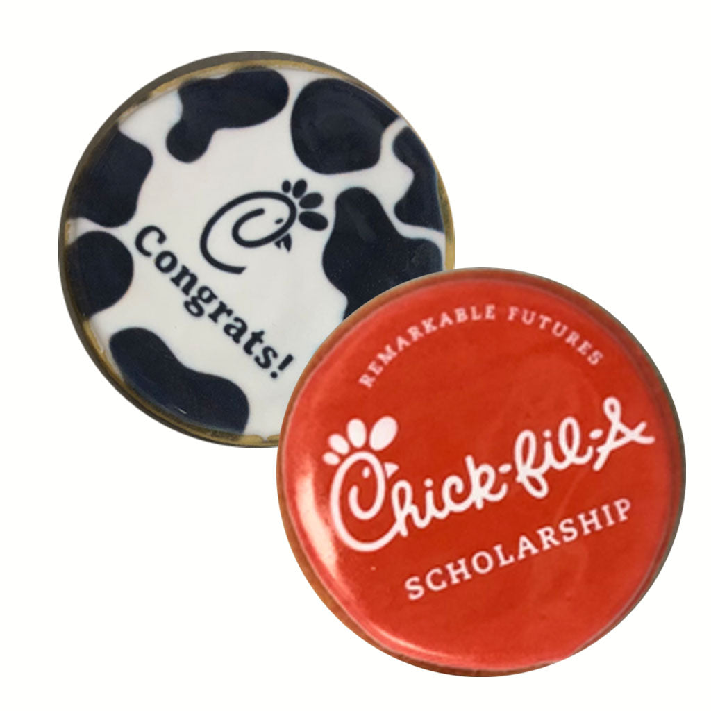 Bulk photo and logo cookies with cow print and red branding.