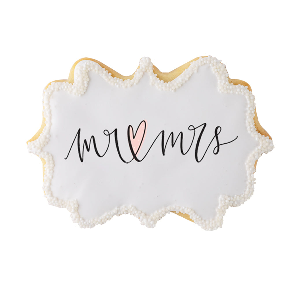 Mr and Mrs wedding cookie with white icing and pearl border