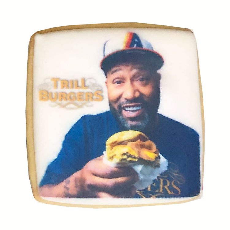 Square photo cookie featuring a Trill Burgers logo and man.
