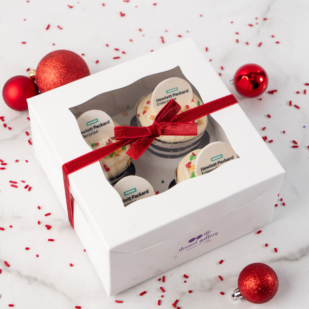 4-pack logo cupcakes in a white gift box with red ribbon