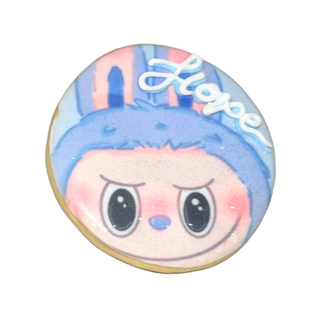 The Monsters cookie with a blue bunny character and Hope text.