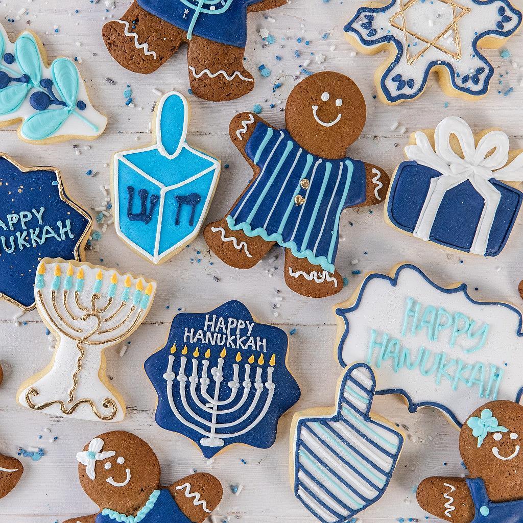 Hanukkah GingerPeople cookies with blue and white icing.