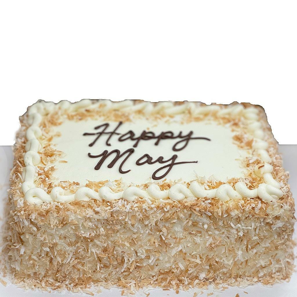 Italian cream sheet cake with coconut and Happy May icing.