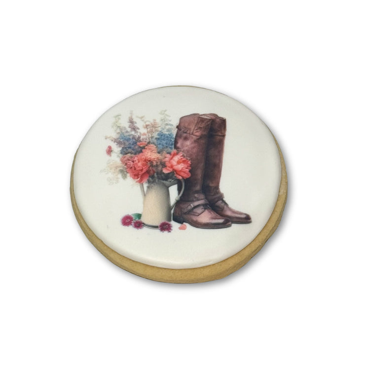 Kentucky Derby cookie with floral and riding boot design