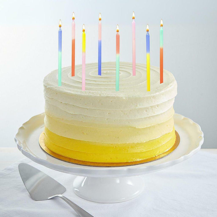 9-inch Luscious Lemon Cake with yellow ombre frosting and candles.