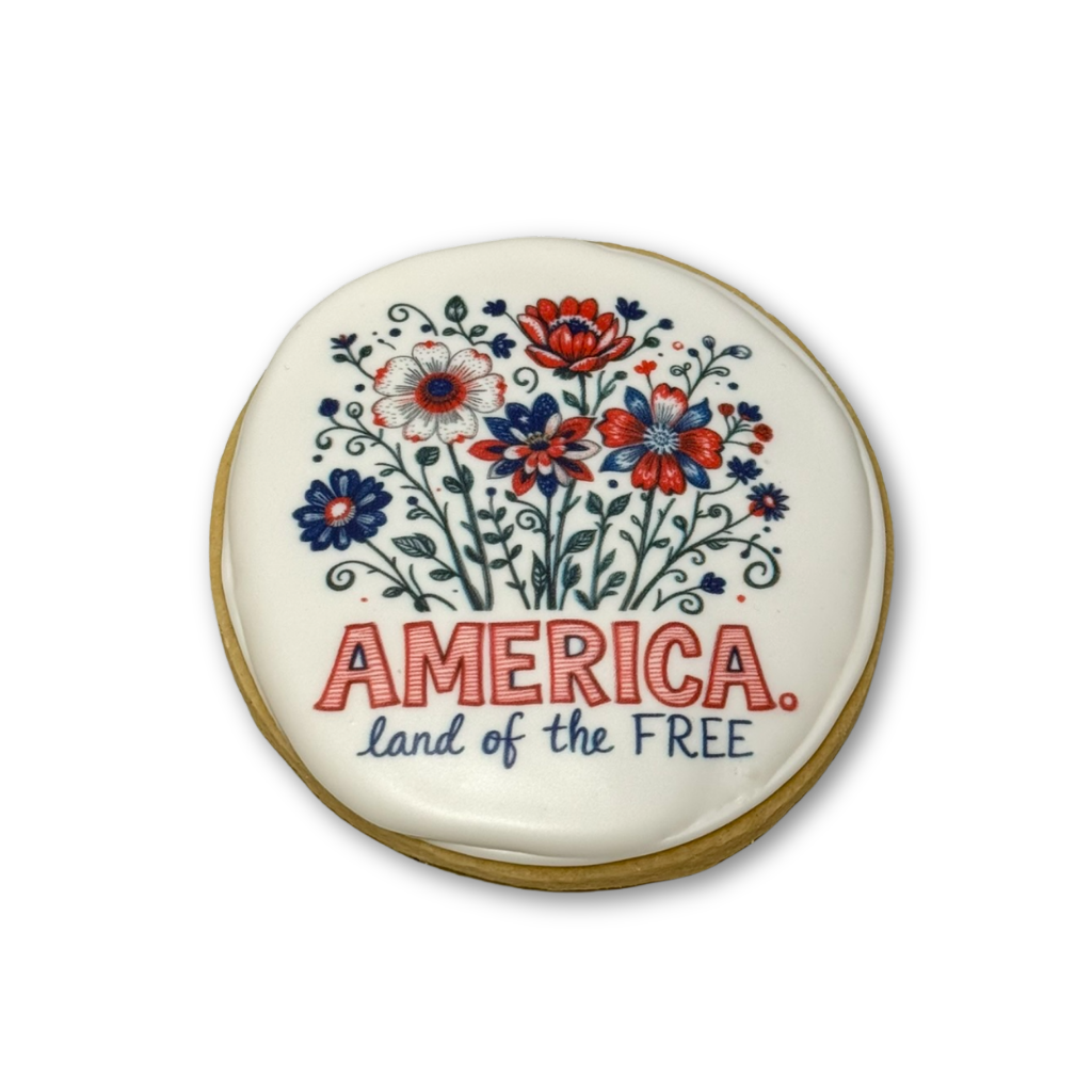 Memorial Day cookie with red, white, and blue floral design.