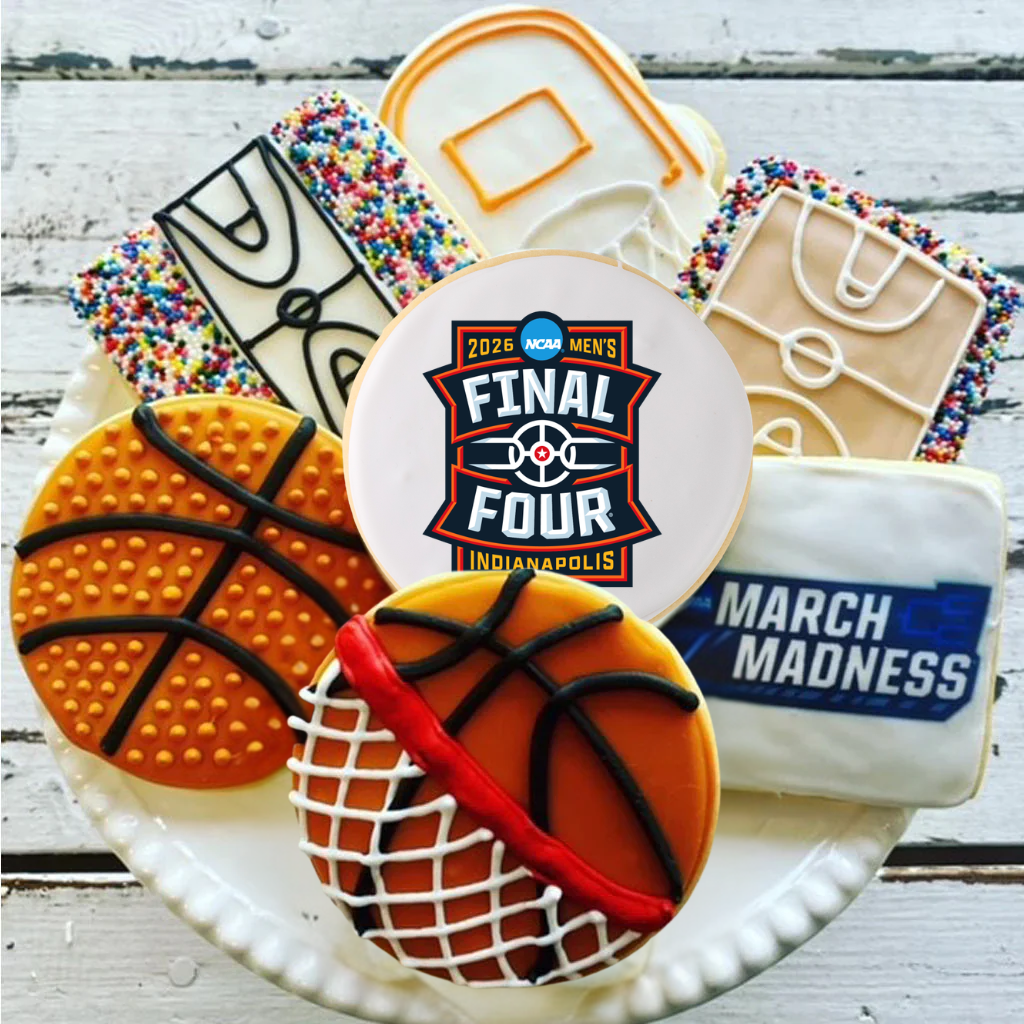 Assorted March Madness Final Four cookies on a white platter.