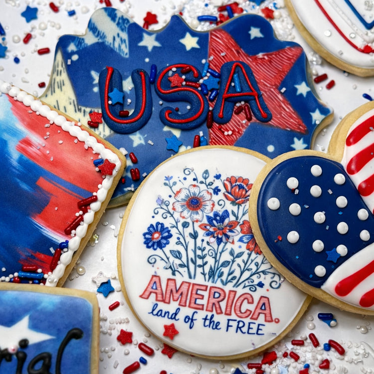 Assorted Memorial Day cookies with red, white, and blue icing.