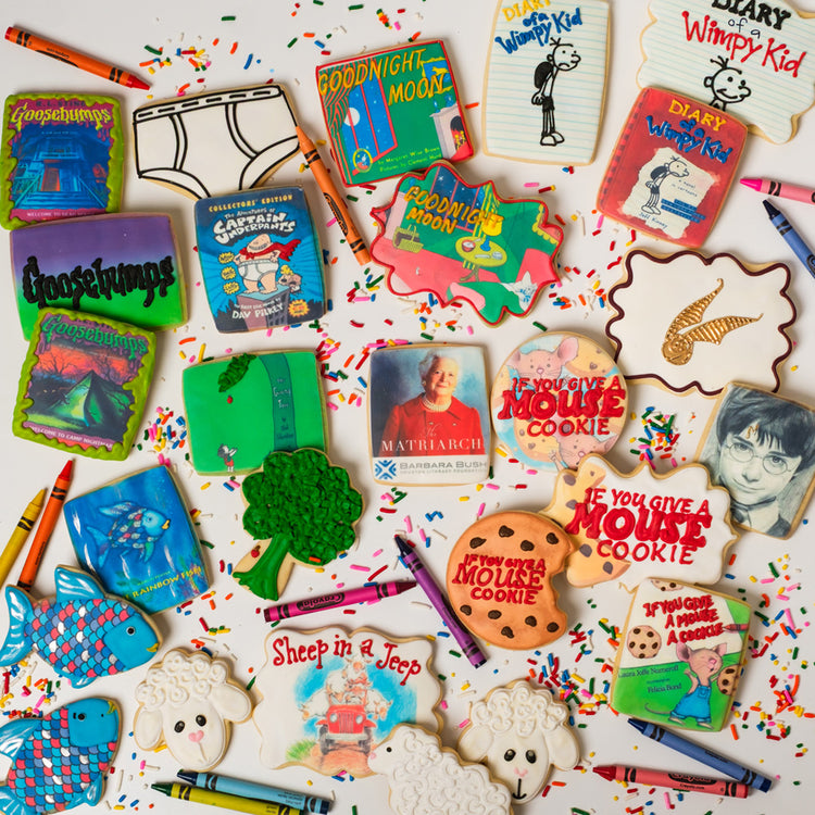 Assorted National Reading Month cookies with book cover designs.