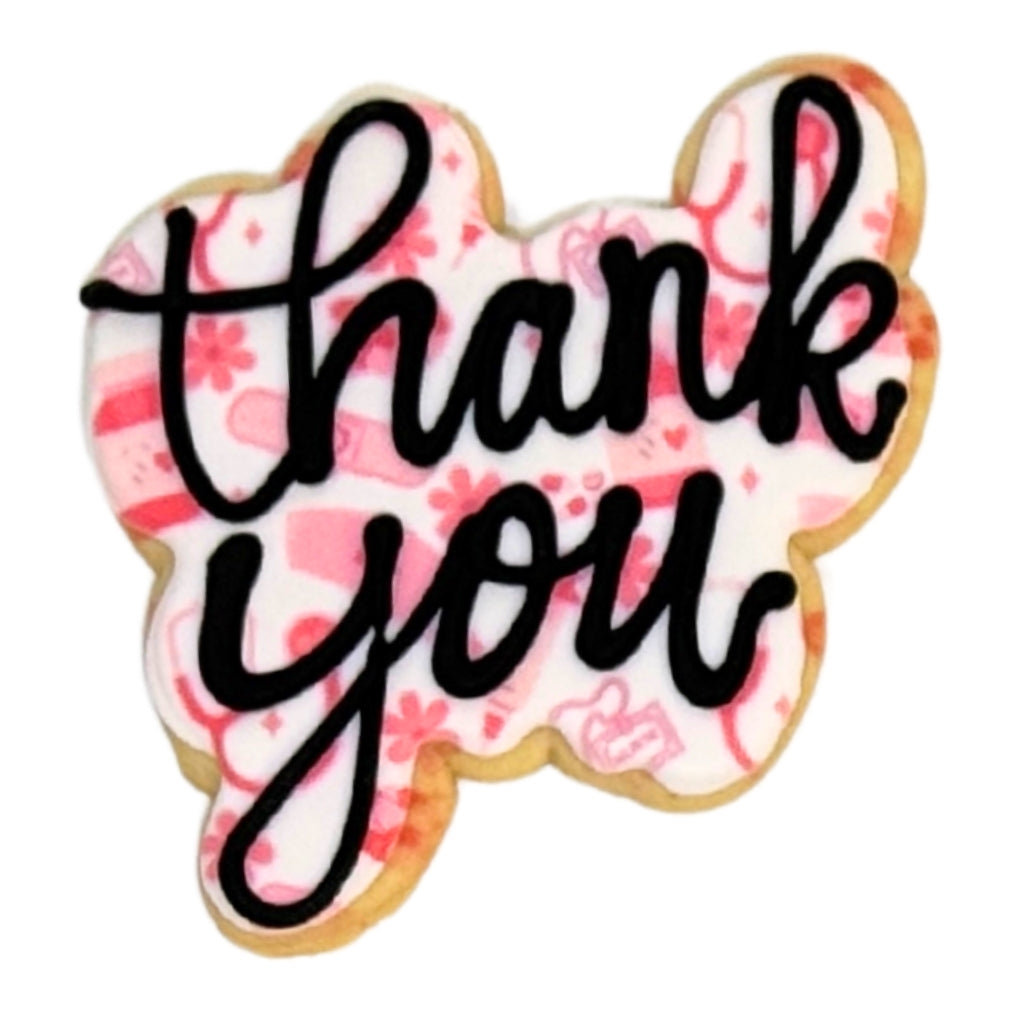 Nurse Appreciation Week cookie with pink medical pattern.