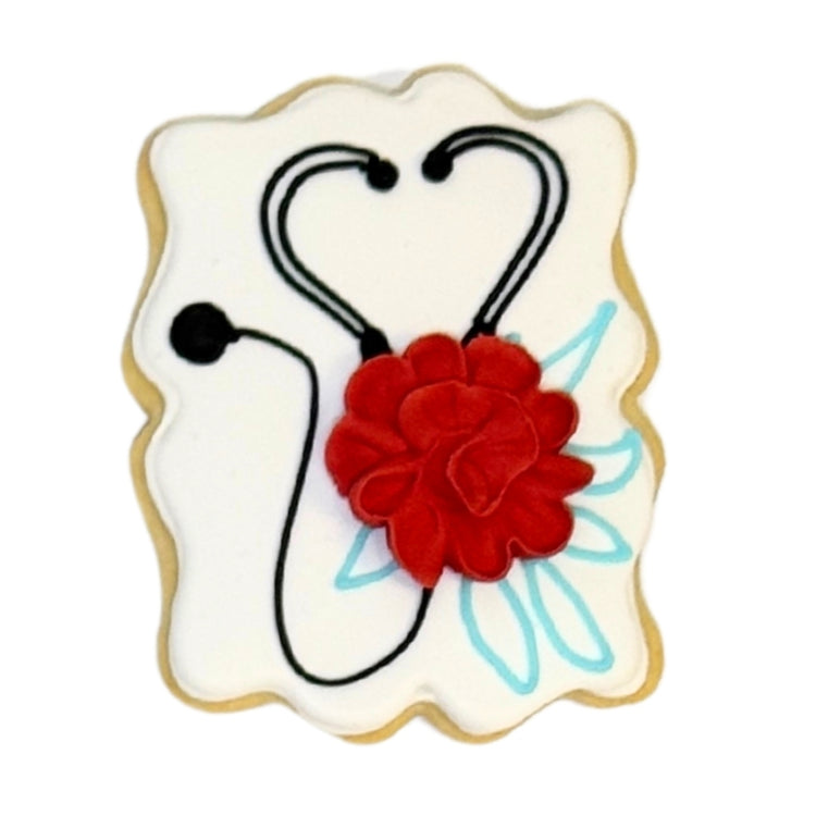 Nurse Appreciation Week cookie with stethoscope and red flower.