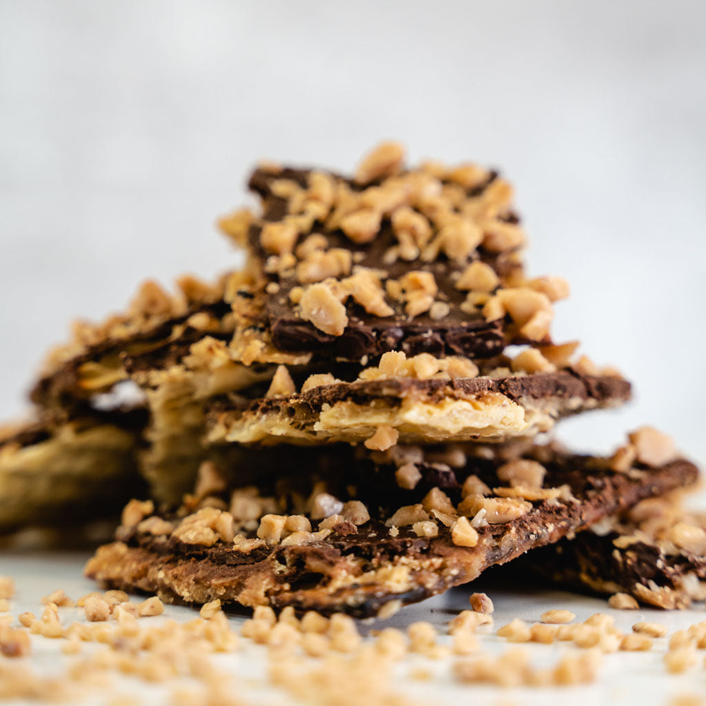 Rabbi Pam's GF Matzo Toffee Bark, stacked with nut topping.