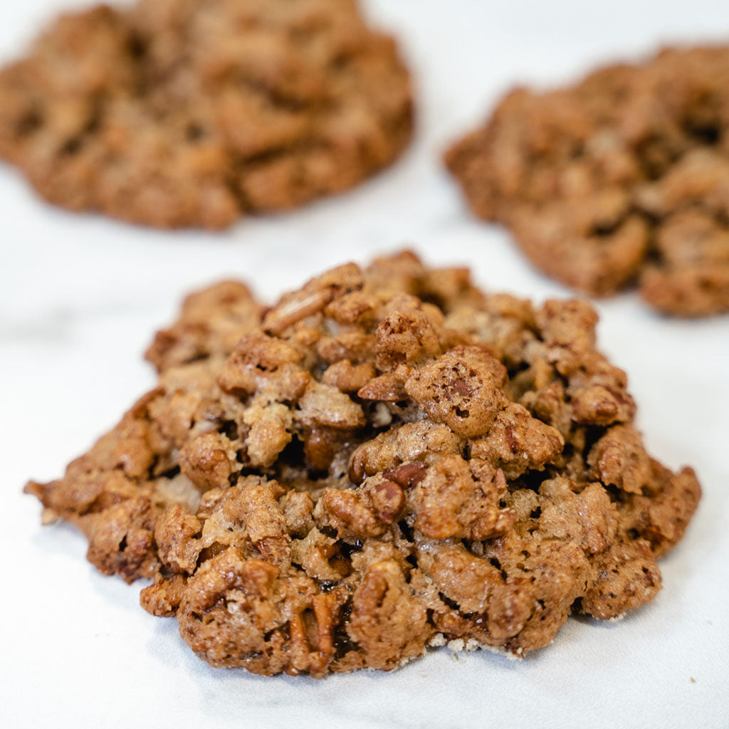 Praline Pecan Chewies on a white marble surface