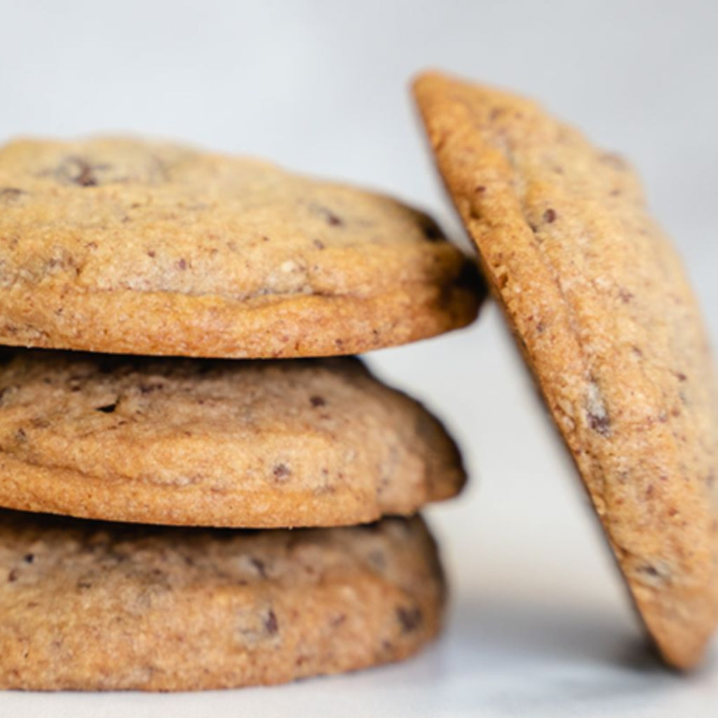 Stack of golden-brown gluten-free chocolate chip cookies