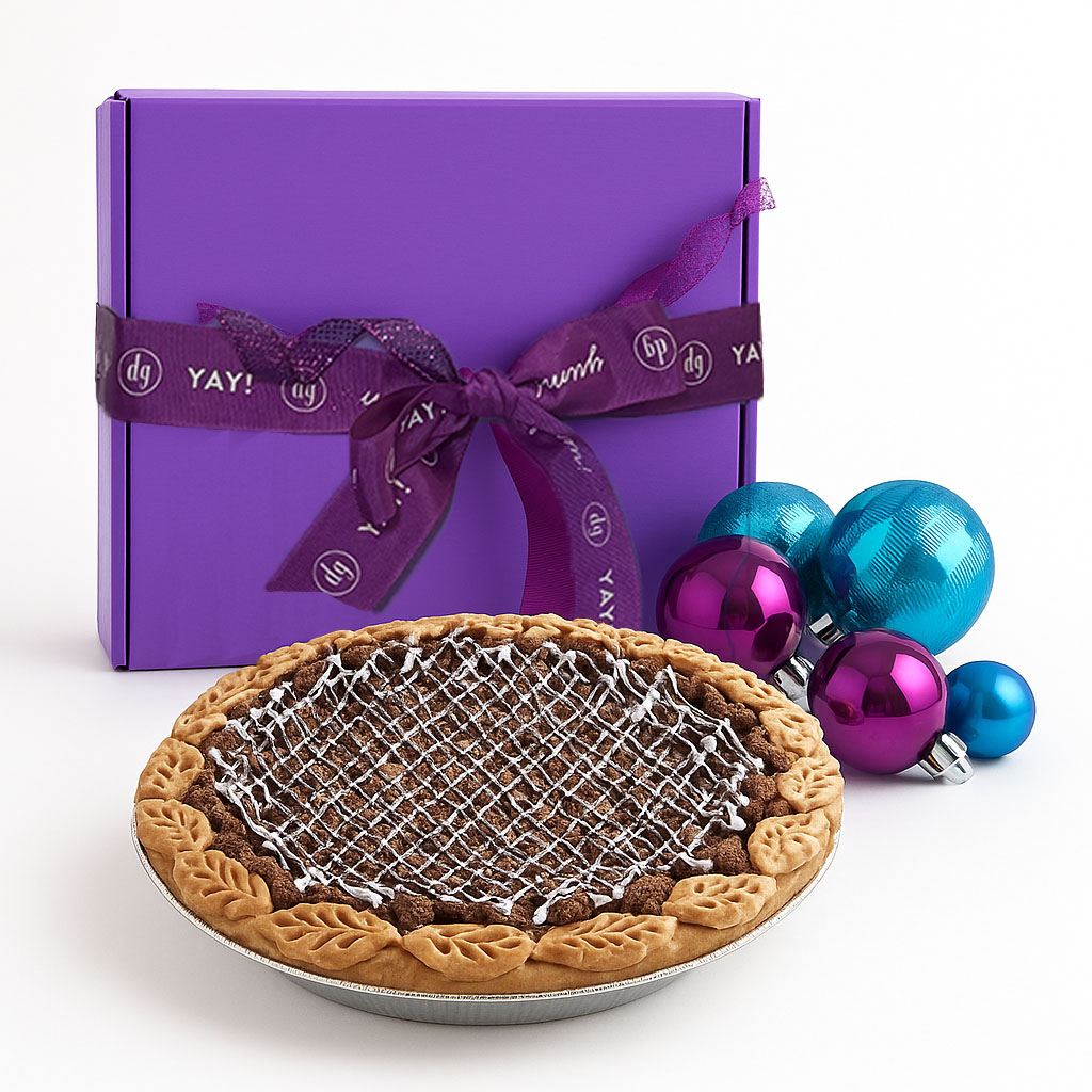 Pie gift box with a purple ribbon and holiday ornaments.