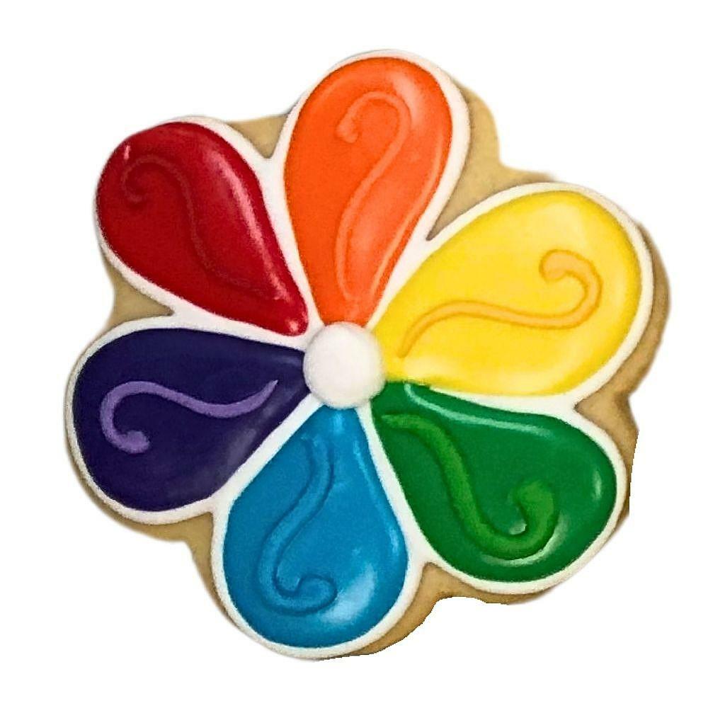 Everything's Coming Up Rainbows flower-shaped sugar cookie