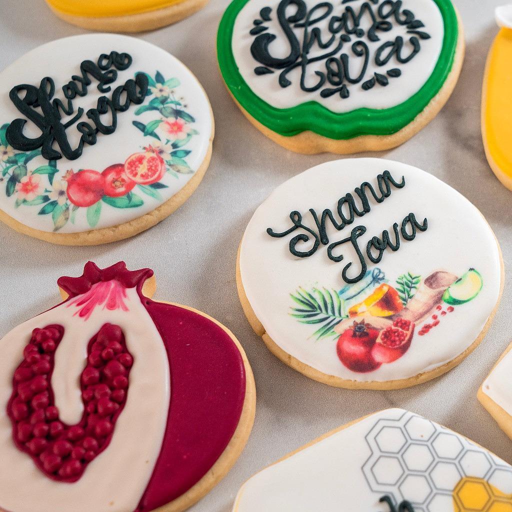 Assorted Jewish High Holidays cookies with Shana Tova icing.