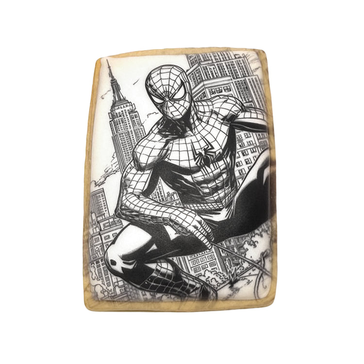 Spiderman cookie with black and white comic book city design.