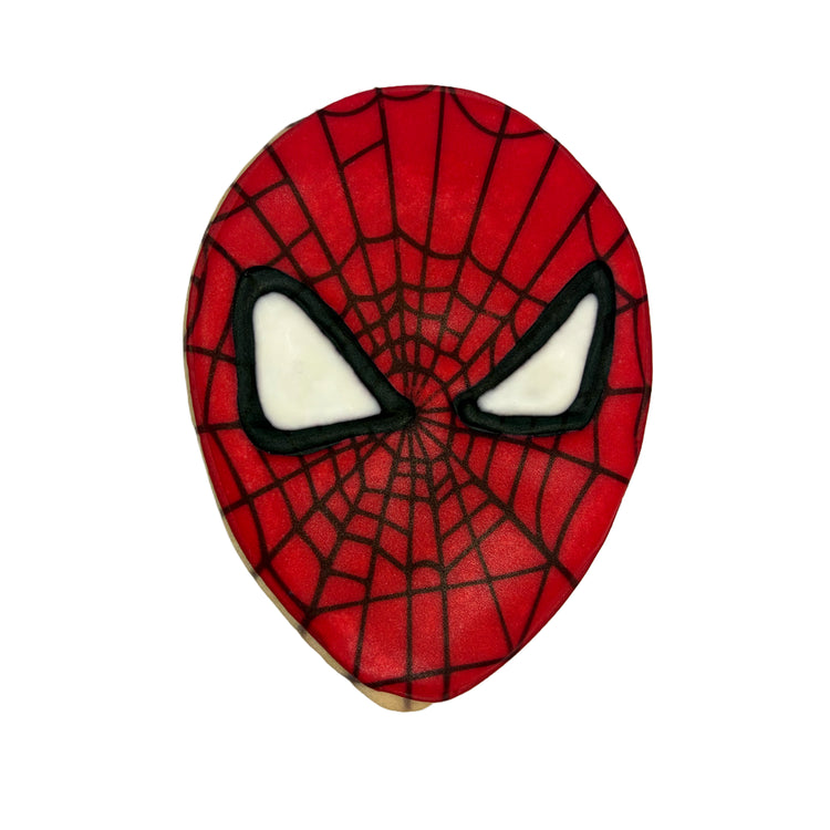 Spiderman cookie with red icing and black web detail