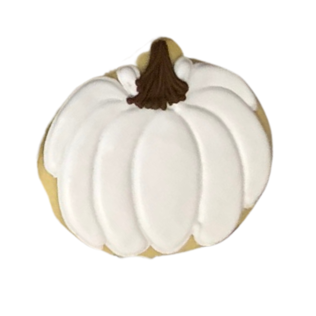 Thanksgiving pumpkin cookie with white icing and brown stem