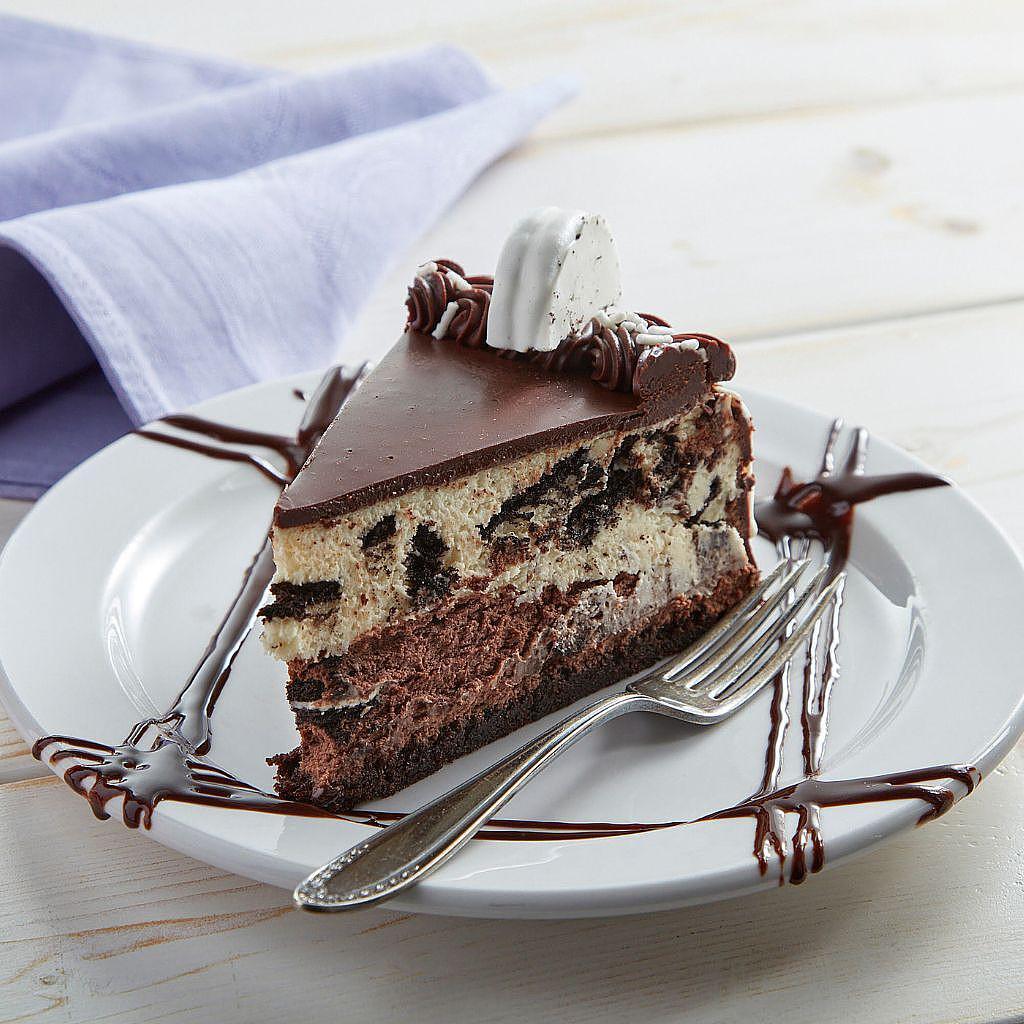 Cookies and cream chocolate cheesecake slice on a plate
