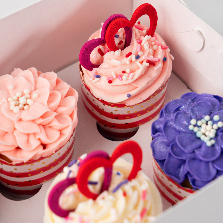 Valentine's Day cupcake collection in striped liners.